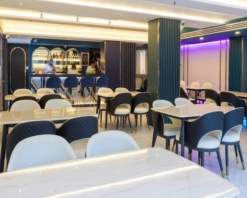 Spacious modern dining area with stylish seating
